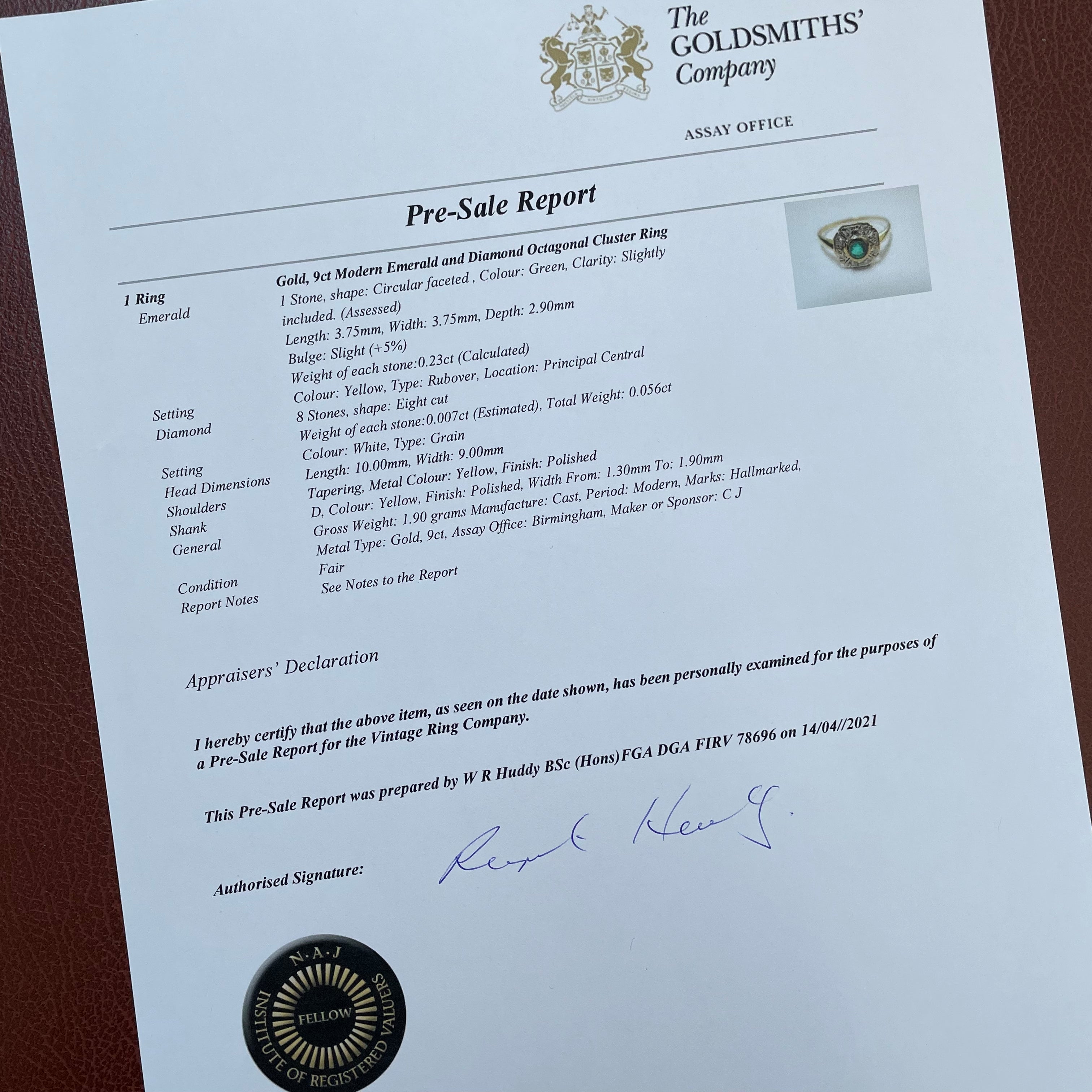 Celeste emerald and diamond cluster engagement ring