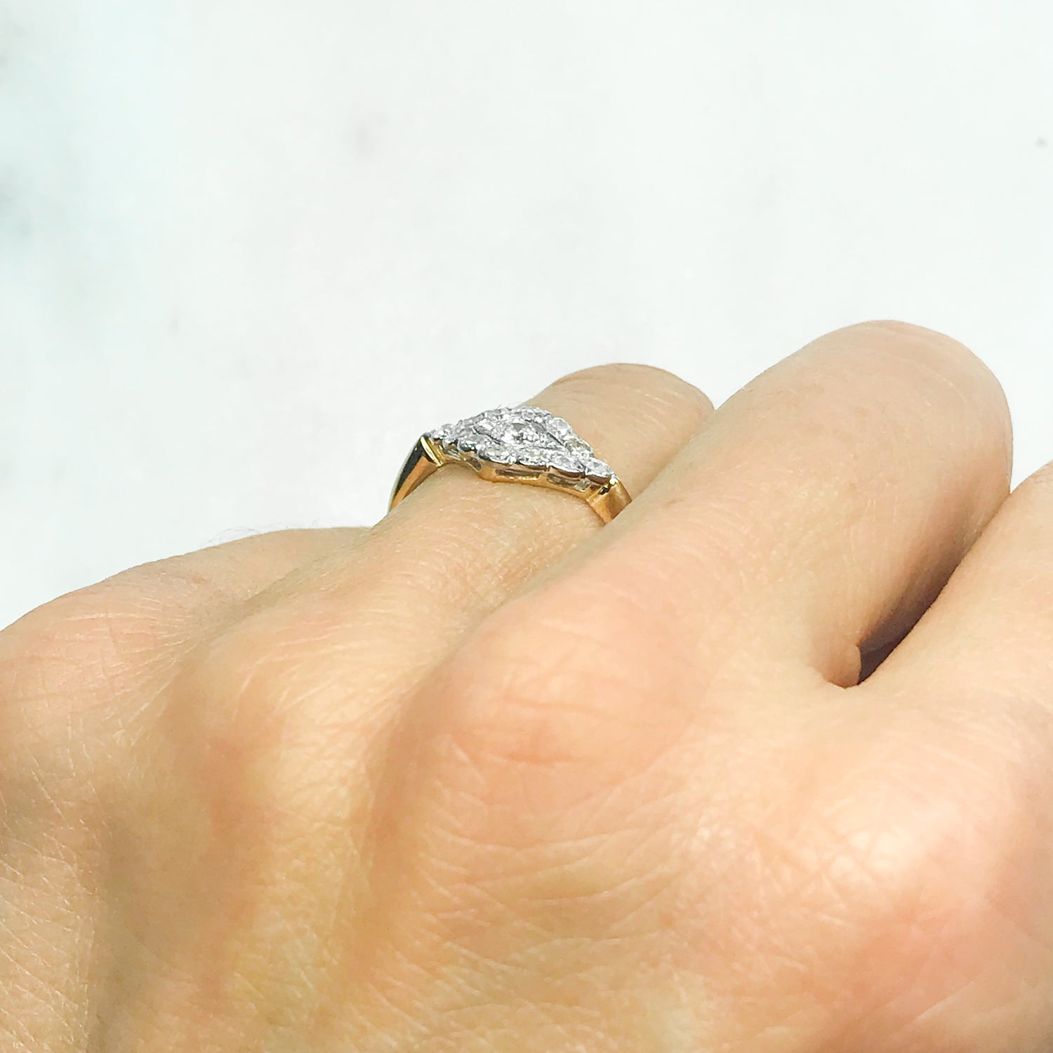 Florrie early 20th century diamond cluster engagement ring