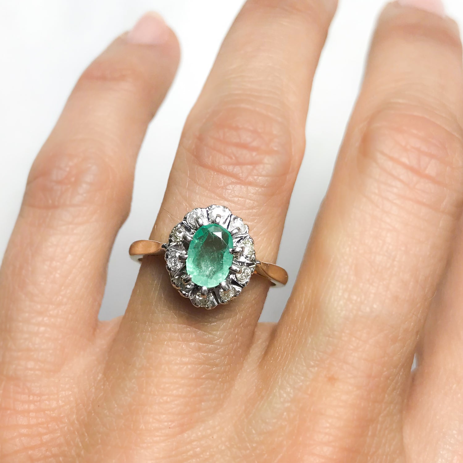 Kitty emerald and diamond engagement ring
