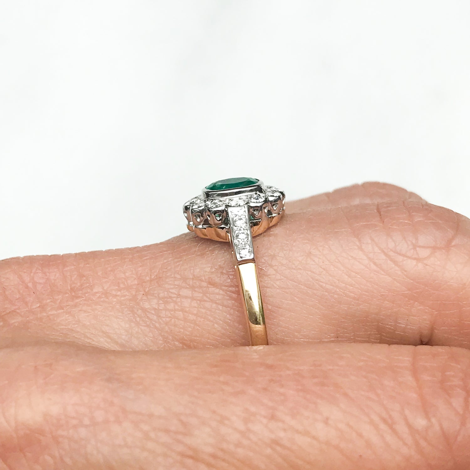 Clara vintage emerald and diamond cluster engagement ring