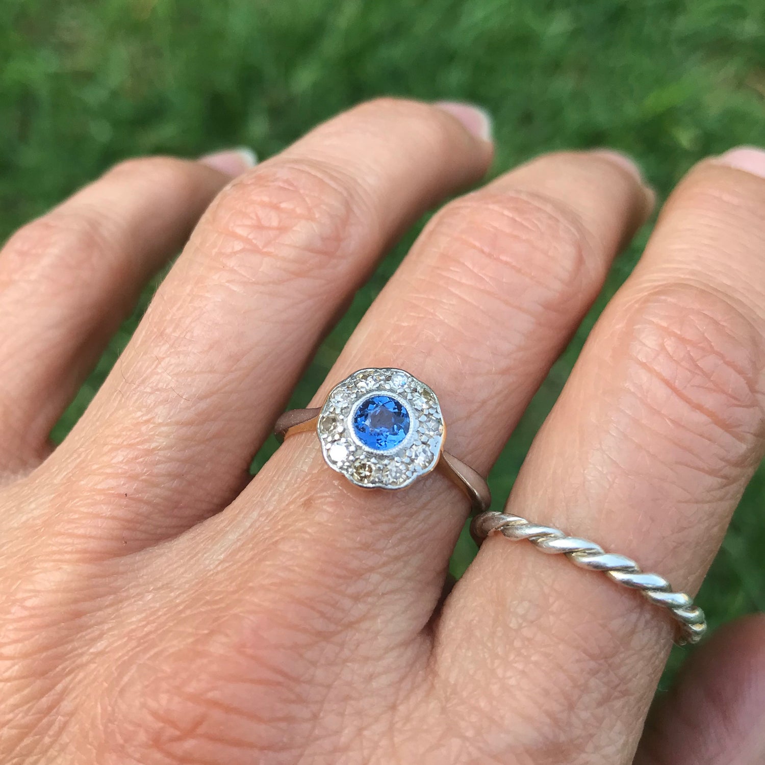 Joyce early 20th century sapphire and diamond daisy ring