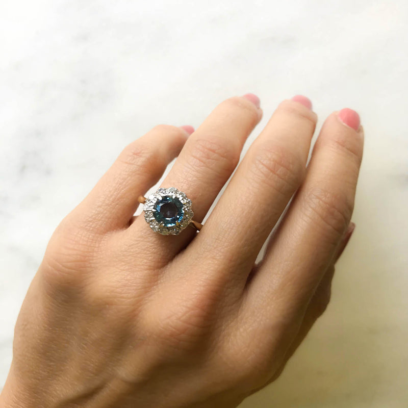 Josephine vintage style sapphire and diamond engagement ring on hand 3